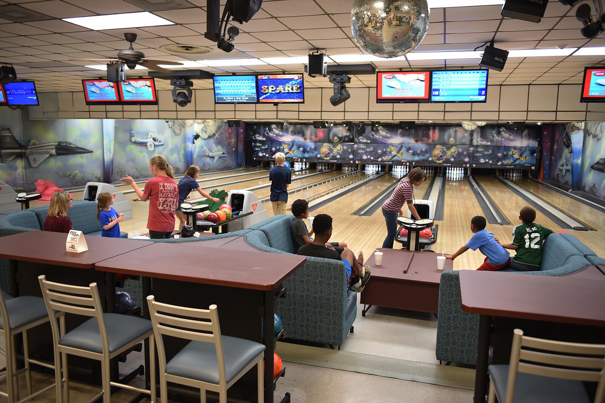 Team BLAZE families bowl June 19, 2018, on Columbus Air Force Base, Mississippi. The 14th Force Support Squadron develops policies and plans and provides services, facilities, training and resources to commanders, base personnel and family members of a base community of over 9,500 people. (U.S. Air Force photo by Airman 1st Class Keith Holcomb)