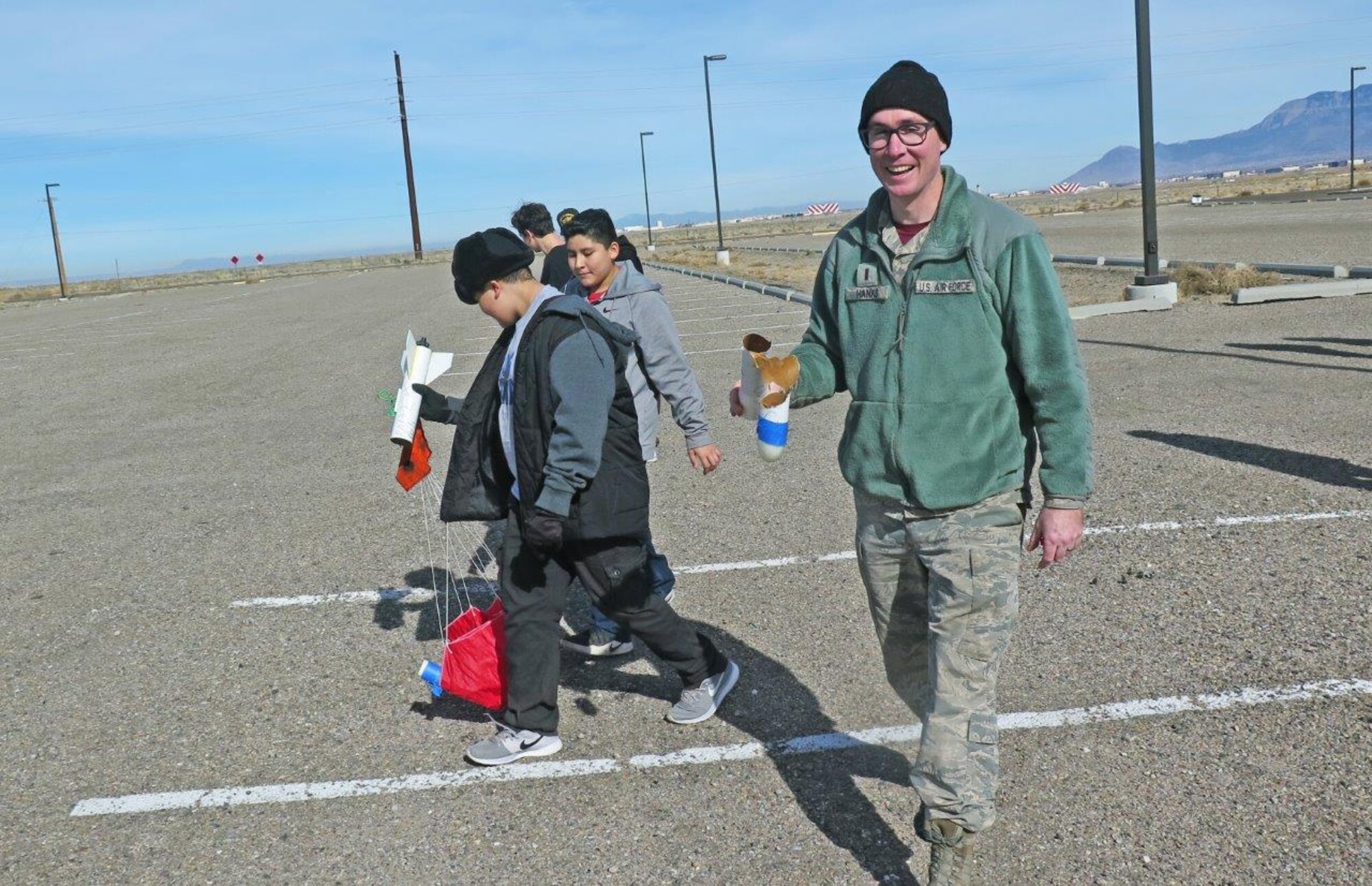 Air Force Research Laboratory scientist 1st Lt. Simeon Hanks at the AFRL STEM Outreach rocket launch event in which he mentored students on building and launching their rockets.