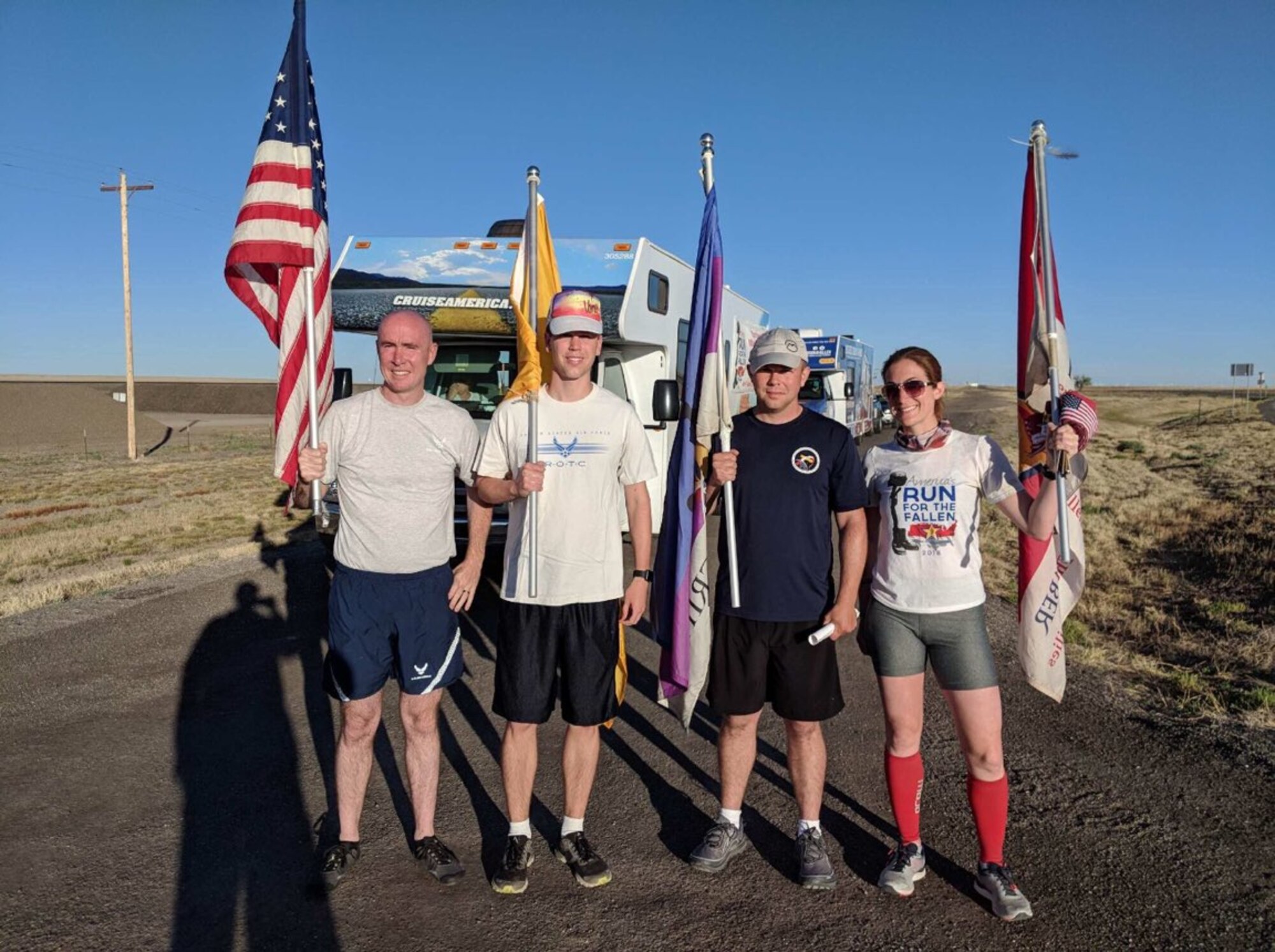 Air Force Research Laboratory scientist 1st Lt. Simeon Hanks (on the left) and fellow runners participate In America’s Run for the Fallen held on Mother’s Day 2018 where he met Gold Star families at the mile markers designated for their fallen service members.