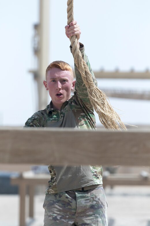 U.S. Army Sgt. Adam Everett, a military policeman assigned to the 202nd Military Police Company, attached to U.S. Army Central, attempts the Swing Stop Jump obstacle during U.S. Army Central's 2018 Best Warrior Competition at Camp Buehring, Kuwait, June 29, 2018. Overcoming obstacles is an essential part of training by demonstrating the capabilities of each Soldier.