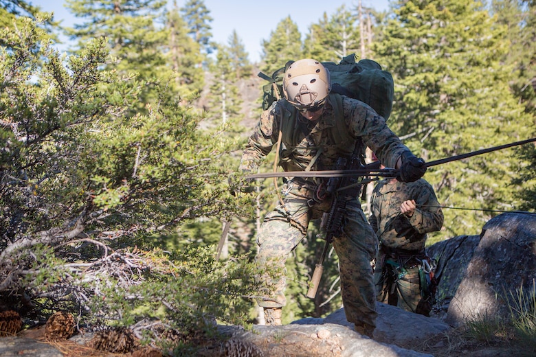A reconnaissance Marine with 4th Reconnaissance Battalion, 4th Marine Division, rappels down a cliff side during Mountain Exercise 3-18, at Mountain Warfare Training Center, Bridgeport, Calif., June 20, 2018. After completing Integrated Training Exercise 4-17 last year, 4th Reconnaissance Battalion took part in MTX 3-18 to further develop small-unit leadership and build an understanding of the different climates and scenarios they could face in the future.