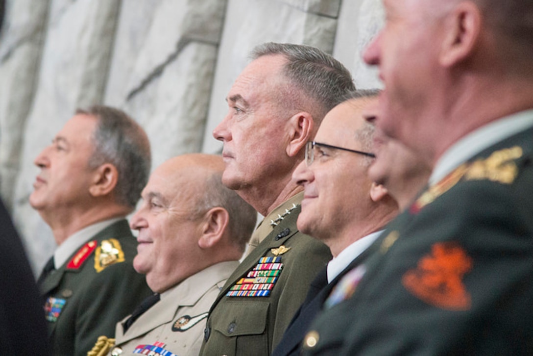 Marine Corps Gen. Joe Dunford, chairman of the Joint Chiefs of Staff, takes part in arrival ceremonies at the 179th Military Committee in Chiefs of Defense Session at the new NATO headquarters building in Brussels, May 16, 2018. DoD photo by Navy Petty Officer 1st Class Dominique A. Pineiro