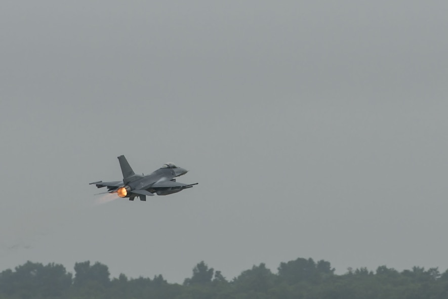 A U.S. Air Force pilot assigned to the 55th Fighter Squadron flies an F-16CM Fighting Falcon at Shaw Air Force Base, S.C., June 27, 2018