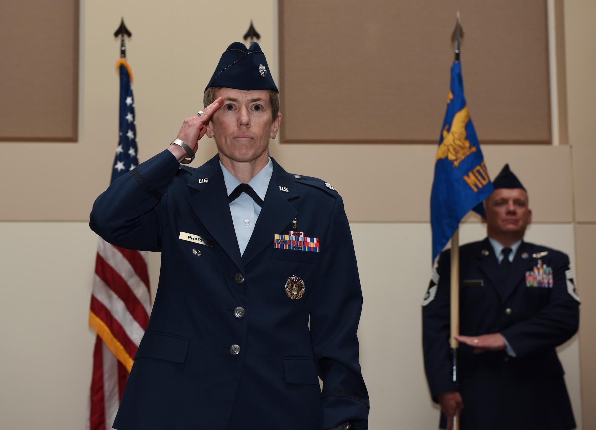 Lt. Col. Shannon Phares, 460th Medical Group commander, receives her first salute from the 460th MDG June 29, 2018, on Buckley Air Force Base, Colorado. Phares, who previously served as the Air Combat Command Aerospace Physiology Program Manager, assumed command from Col. Matthew Hanson. (U.S. Air Force photo by Airman 1st Class Michael D. Mathews)