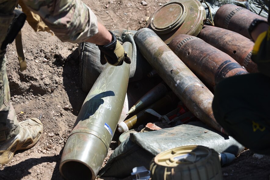 During a field training exercise by the 90th Civil Engineer Squadron Explosive Ordnance Disposal flight, the Airmen were able to get hands-on experience with unexploded ordinance found at home and over sea’s locations June 27, 2018, at the EOD range, F.E. Warren Air Force Base, Wyo. The EOD team is continually updating their knowledge on weapons used by other militaries and implementing them into field training. (U.S. Air Force photo by Airman 1st Class Abbigayle Wagner)