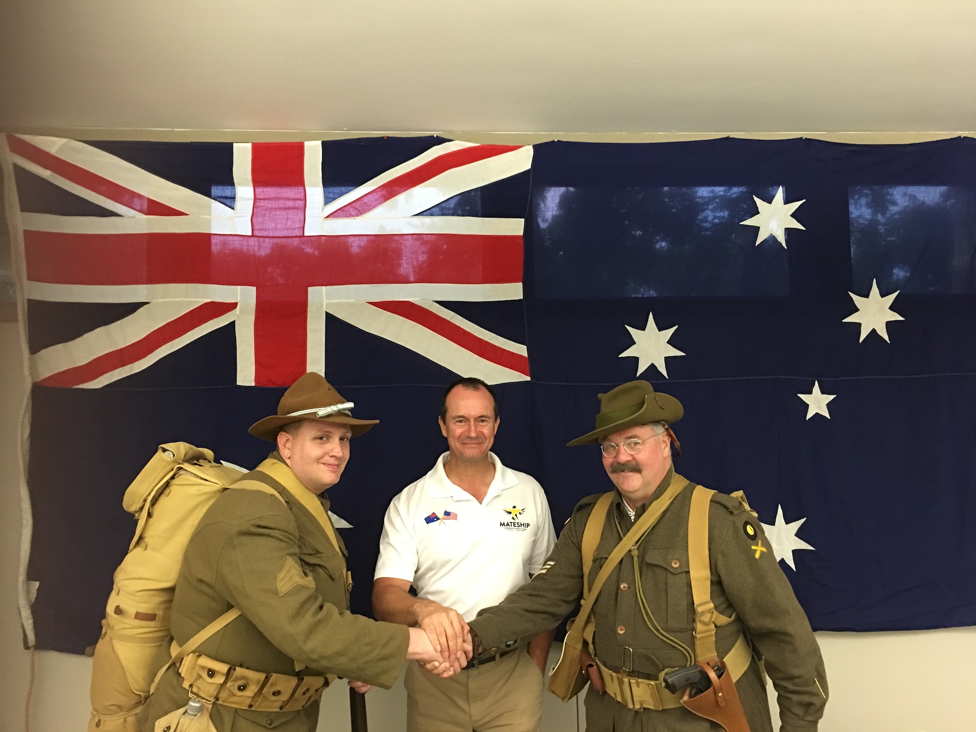 Australians celebrating “‘100 years of Mateship”’ between Australia and the United States at Wright-Patterson Air Force Base on June 20 are (left to right): Jeremy Bowles; Wing Commander Andrew State of the Royal Australian Air Force; and Joseph Otmar. Bowles and Otmar are dressed in period uniforms like those worn during the Battle of Hamel on July 4, 1918. (U.S. Air Force photo/Glenn DeBerry)