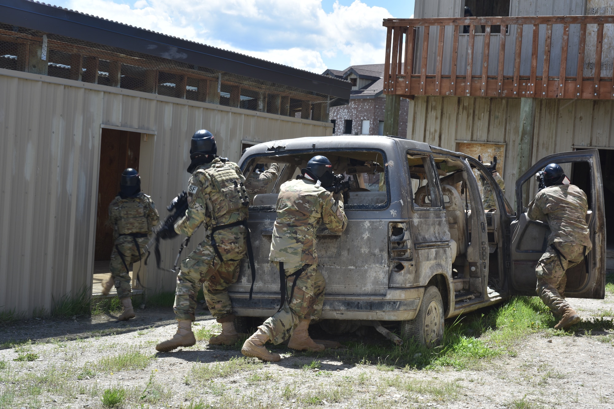Airmen with the 841st Missile Security Forces Squadron corner an opposing member during a training scenario June 24, 2018, at Fort Harrison, Mont.
