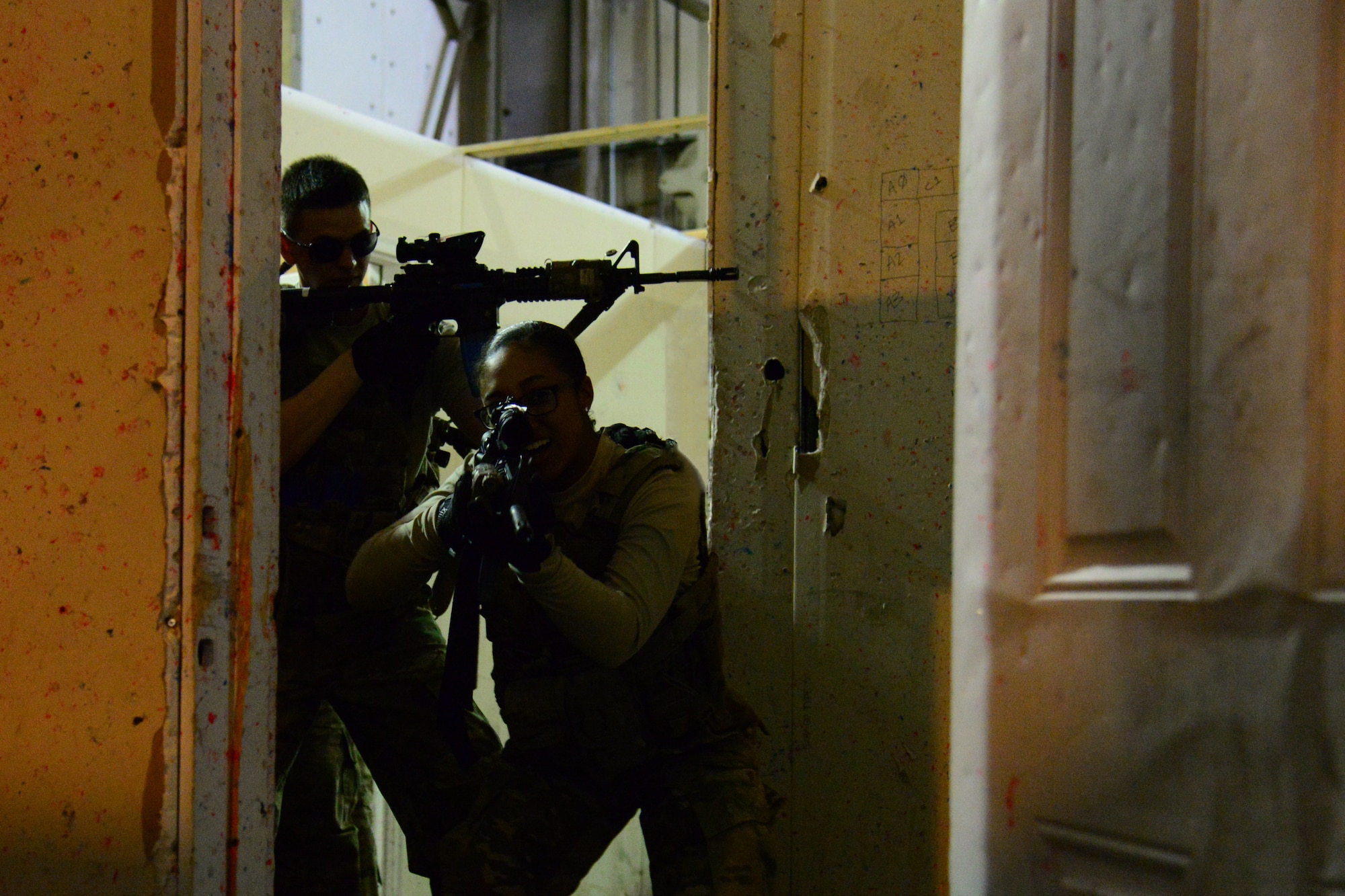 Airmen with the 841st Missile Security Forces Squadron run through protocol to enter a room during training June 14, 2018, at Malmstrom Air Force Base, Mont.