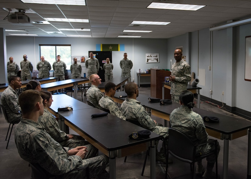 Chief Master Sgt. of the Air Force Kaleth O. Wright talks with Airmen of the 633rd Security Forces Squadron during his visit to Joint Base Langley-Eustis, Virginia, June 29, 2018. Wright toured JBLE for two days seeing the day-to-day operations of the different wings and units here. (U.S. Air Force photo by Airman 1st Class Anthony Nin-Leclerec)