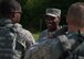 Chief Master Sgt. of the Air Force Kaleth O. Wright complements the Airmen of the 633rd Security Forces Squadron for their performance during his visit to Joint Base Langley-Eustis, Virginia, June 29, 2018. Wright toured JBLE for two days seeing the day-to-day operations of the different wings and units here. (U.S. Air Force photo by Airman 1st Class Anthony Nin-Leclerec)