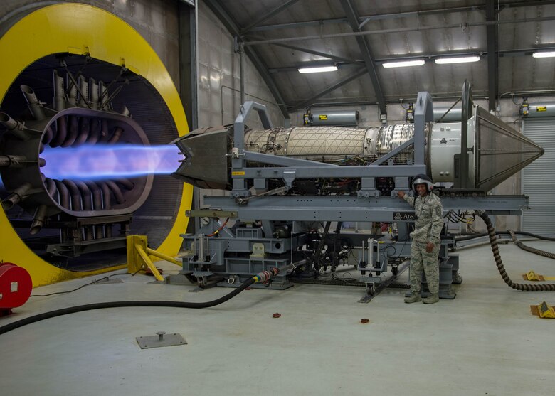 Chief Master Sgt. of the Air Force Kaleth O. Wright stands next to an F-22 Raptor engine during his visit to Joint Base Langley-Eustis, Virginia, June 29, 2018. Wright toured JBLE for two days seeing the day-to-day operations of the different wings and units here. (U.S. Air Force photo by Airman 1st Class Anthony Nin-Leclerec)