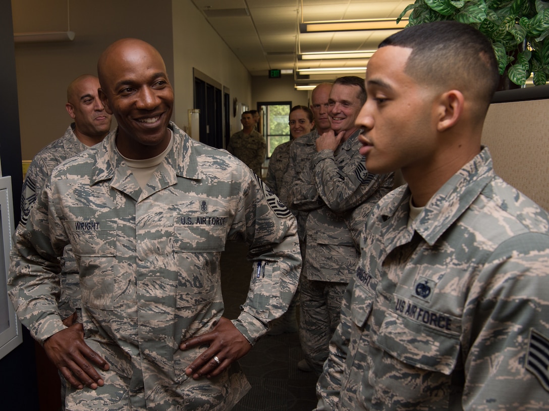 Staff Sgt. Jordan Basnight, 441st Vehicle Support Chain Operations Squadron NCO in charge, gives a brief on his section to Chief Master Sgt. of the Air Force Kaleth O. Wright at Joint Base Langley-Eustis, Va. June 28, 2018. Basnight provided an overview of 441th VSCOS support and their role as the vehicle enterprise manager here. (U.S. Air Force photo by Senior Airman Tristan Biese)