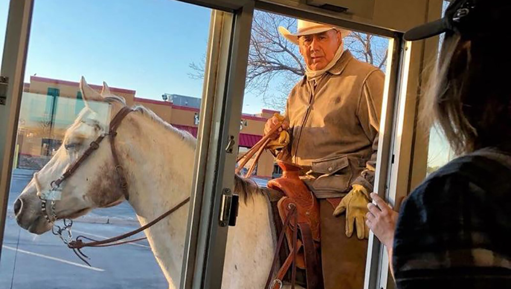 17th Civil Engineer Squadron heavy equipment operator, George Nava gets coffee from a coffee shop drive-thru. (Courtesy photo)