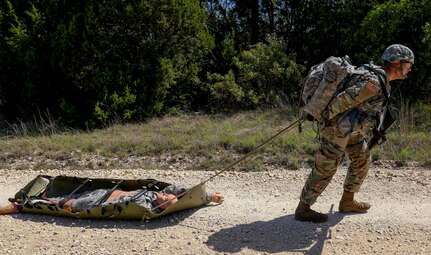 During the combat lane portion of the competition, Spc. Bryce Falgiani had to evaluate a casualty, perform first aid and transport the casualty. Falgiani won the Soldier slot in the latest Best Warrior Competition and is advancing to the final round in October.
