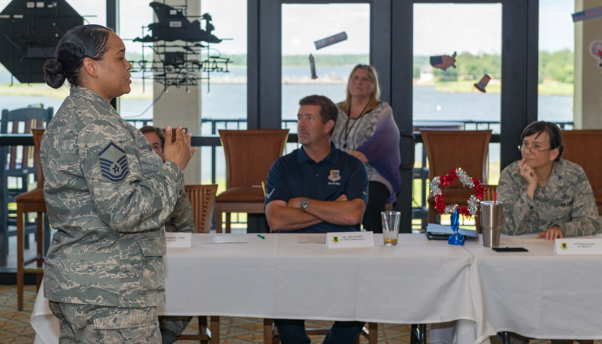 U.S. Air Force Master Sgt. Dennise Griggs, 81st Diagnostic and Therapeutics Squadron anatomical pathology NCO in charge, briefs the Keesler “Resiliency” Challenge to the Dragon Tank panel at the 81st Training Wing Dragon Tank in the Bay Breeze Event Center’s Dragon’s Lair at Keesler Air Force Base, Mississippi, June 29, 2018. The event afforded Keesler personnel the opportunity to pitch their breakthrough and innovative ideas to the panel judges with the hope of bringing them to fruition. (U.S. Air Force photo by Andre’ Askew)