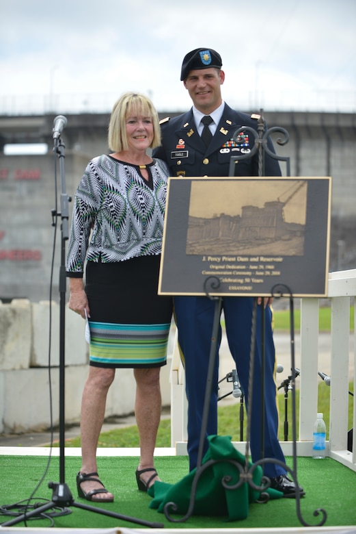 Harriett Priest, daughter of the late Congressman J. Percy Priest, and Maj. Justin Toole, U.S. Army Corps of Engineers Nashville District deputy commander, unveil a commemorative plaque during the 50th Anniversary of J. Percy Priest Dam and Reservoir at the dam in Nashville, Tenn., June 29, 2018. (USACE Photo by Mark Rankin)