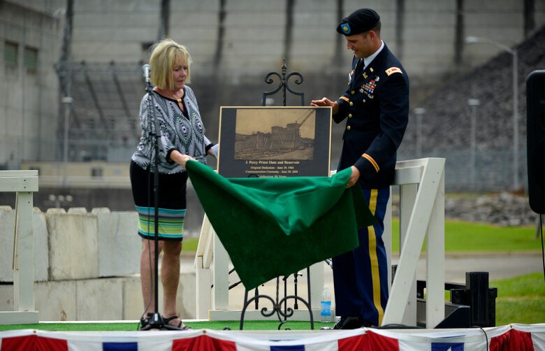 Harriett Priest, daughter of the late Congressman J. Percy Priest, and Maj. Justin Toole, U.S. Army Corps of Engineers Nashville District deputy commander, unveil a commemorative plaque during the 50th Anniversary of J. Percy Priest Dam and Reservoir at the dam in Nashville, Tenn., June 29, 2018. (USACE Photo by Mark Rankin)