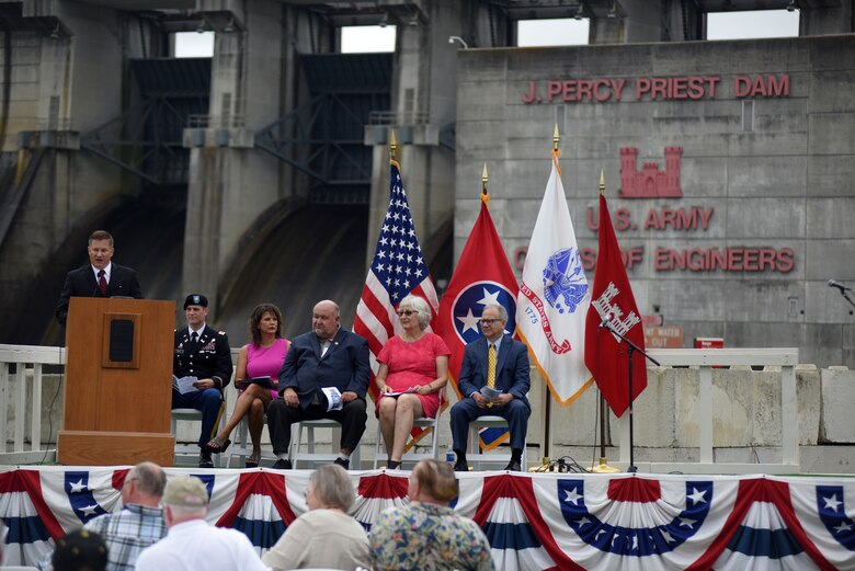 Tommy Mason, J. Percy Priest Lake resource manager, welcomes visitors to the 50th Anniversary of J. Percy Priest Dam and Reservoir at the dam in Nashville, Tenn., June 29, 2018. The ceremony took place 50 years to the day after President Lyndon B. Johnson dedicated the project. (USACE Photo by Lee Roberts)