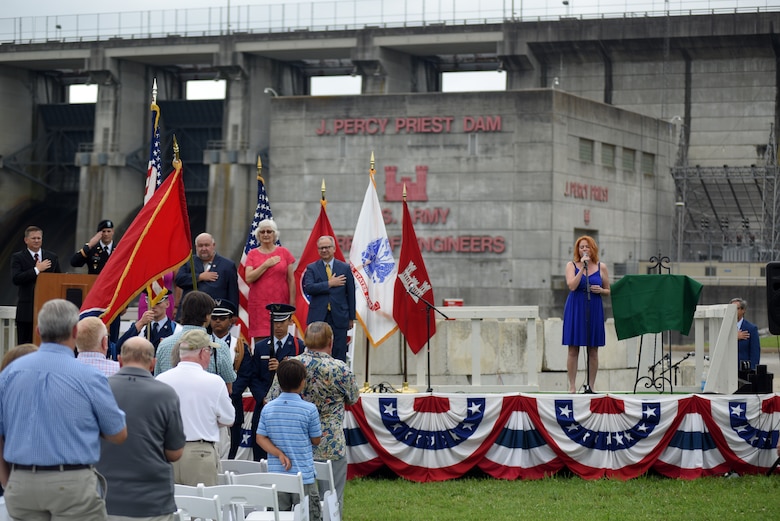 Music Artist Alysha Nyx sings the National Anthem during the 50th Anniversary of J. Percy Priest Dam and Reservoir at the dam in Nashville, Tenn., June 29, 2018. (USACE Photo by Lee Roberts)