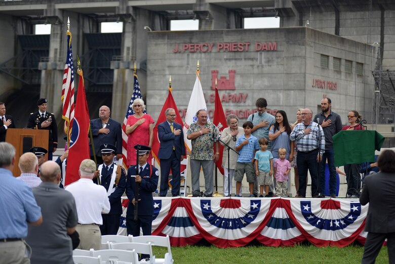 The family of Col. Jesse Fishback leads the Pledge of Allegiance during the 50th Anniversary of J. Percy Priest Dam and Reservoir at the dam in Nashville, Tenn., June 29, 2018. The late colonel served as the district engineer of the U.S. Army Corps of Engineers Nashville District when officials dedicated the project June 29, 1968. (USACE Photo by Lee Roberts)