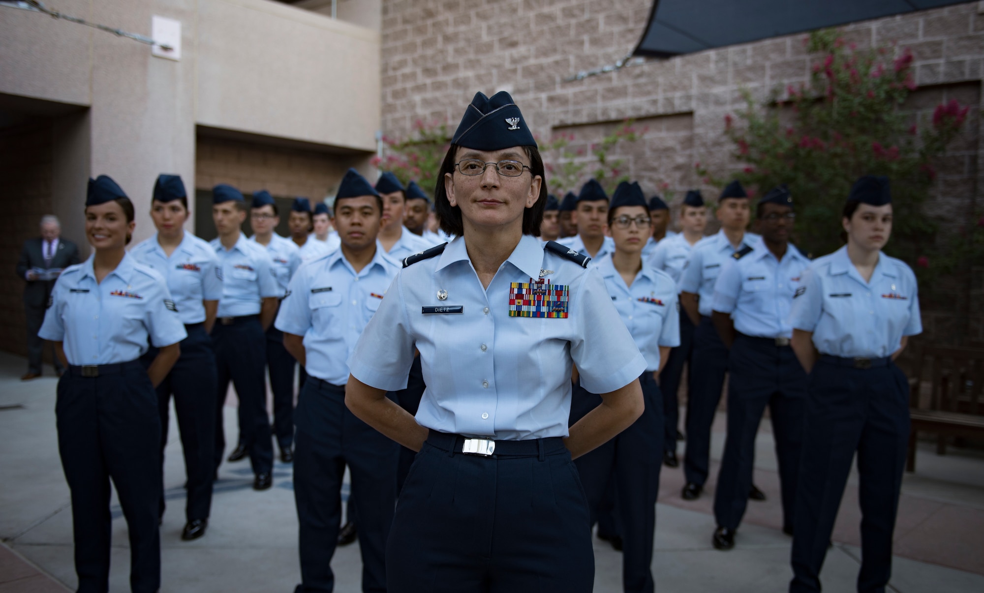 Col. Suzie Dietz, 99th Inpatient Operations Squadron commander, stands in front of a flight of Airmen during a change of command ceremony at Nellis Air Force Base, Nevada, June 29, 2018. The 99th IPTS is responsible for delivering safe care for Department of Defense patients. (U.S. Air Force photo by Airman 1st Class Andrew D. Sarver)