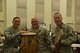 From left, U.S. Air Force Capt. Rafael Toro-Quiñones, commander and conductor of the Band of the Golden West, U.S. Air Force Staff Sgt. Wilfredo Cruz, on solo percussion and Tech. Sgt. Marco Muñoz, composer, pose for a photo during rehearsal at Travis Air Force Base, California, June 22, 2018. (U.S. Air Force photo by Senior Airman Mary Gant/Released)