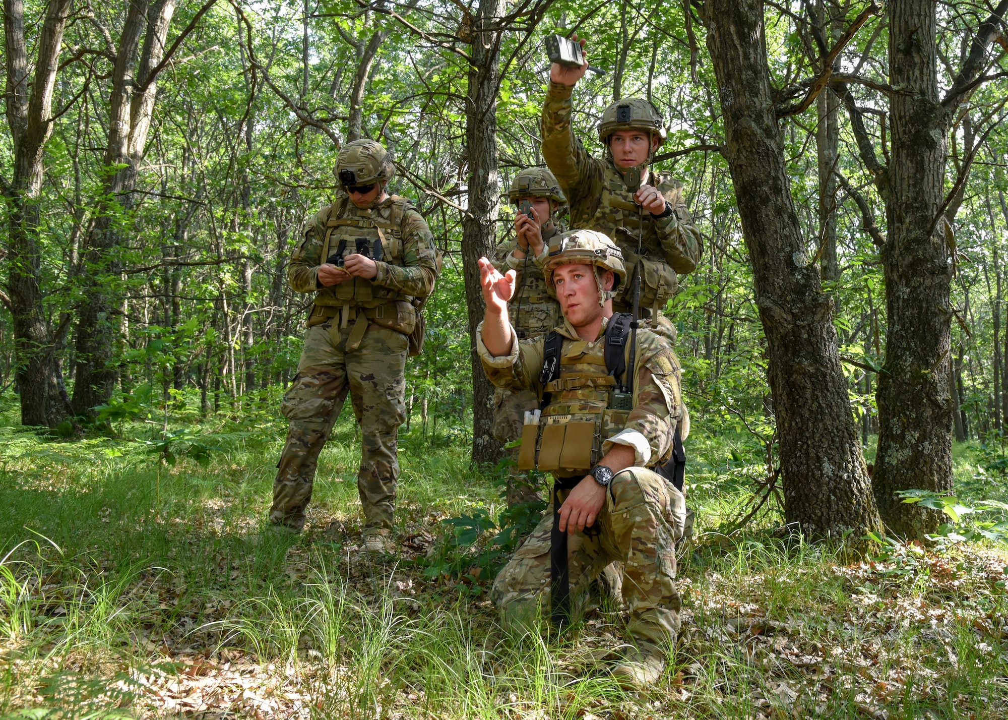 A team of Explosive Ordnance Disposal technicians work their way through a land navigation course June 25, 2018, at Fort McCoy, Wisconsin. The course allowed Airmen to practice their skills in map reading, compass use, and pace counting.
(U.S. Air National Guard photo by Airman Cameron Lewis)