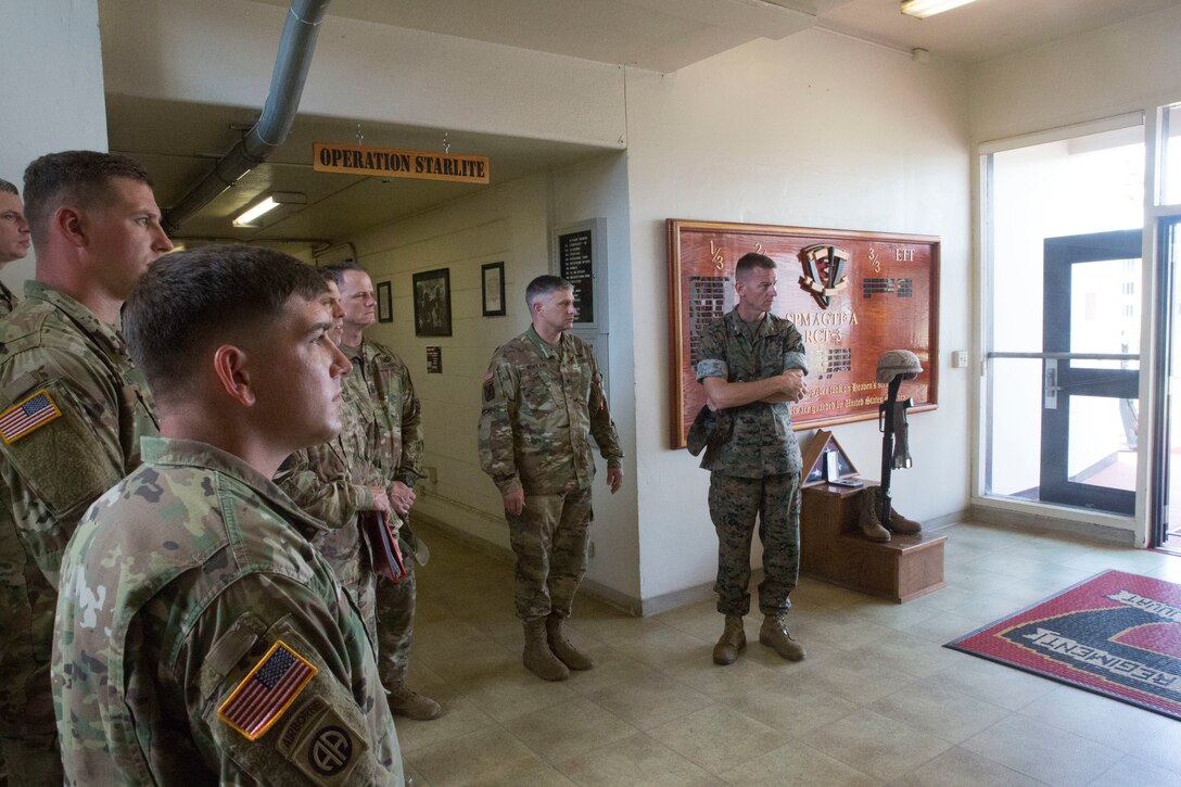 180701-M-KC456-2007 MARINE CORPS BASE HAWAII (July 1, 2018) U.S. Marine Corps Col. Michael S. Styskal, commander, 3rd Marine Regiment, provides a tour of the training facilities aboard Marine Corps Base Hawaii to members of the U.S. Army participating in Rim of the Pacific (RIMPAC) exercise July 1, 2018. RIMPAC provides high-value training for task-organized, highly-capable Marine Air-Ground Task Force and enhances the critical crisis response capability of U.S. Marines in the Pacific. Twenty-five nations, 46 ships, five submarines, about 200 aircraft and 25,000 personnel are participating in RIMPAC from June 27 to Aug. 2 in and around the Hawaiian Islands and Southern California. (U.S. Marine Corps photo by Lance Cpl. Thomas P. Miller)