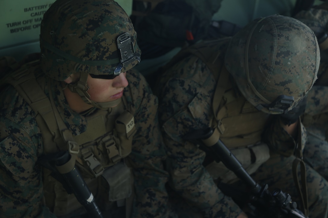 U.S. Marines with 2nd Battalion, 1st Marine Regiment, await training during assault amphibious vehicle familiarization training as part of Rim of the Pacific (RIMPAC) exercise at Marine Corps Base Camp Pendleton, California, June 28, 2018. Marines training with partner nations from around the world enhances prowess. RIMPAC provides high-value training for task-organized, highly-capable Marine Air-Ground Task Force and enhances the critical crisis response capability of U.S. Marines in the Pacific. (U.S. Marine Corps photo by Cpl. Jeremy Laboy)