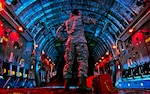 Senior Airman checks inside of C-17 Globemaster III before beginning preflight inspection March 27, 2013, at Wright-Patterson Air Force Base, Ohio (U.S. Air Force/Mikhail Berlin)