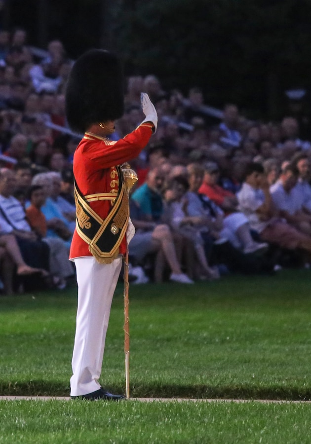 Master Gunnery Sgt. Duane F. King conducts a performance by "The Presidents Own" United States Marine Band during a Friday Evening Parade at Marine Barracks Washington D.C., June 29, 2018. The guest of honor for the ceremony was the Under Secretary of the Navy, Thomas B. Modly, and the hosting official was the Assistant Commandant of the Marine Corps, Gen. Glenn M. Walters.