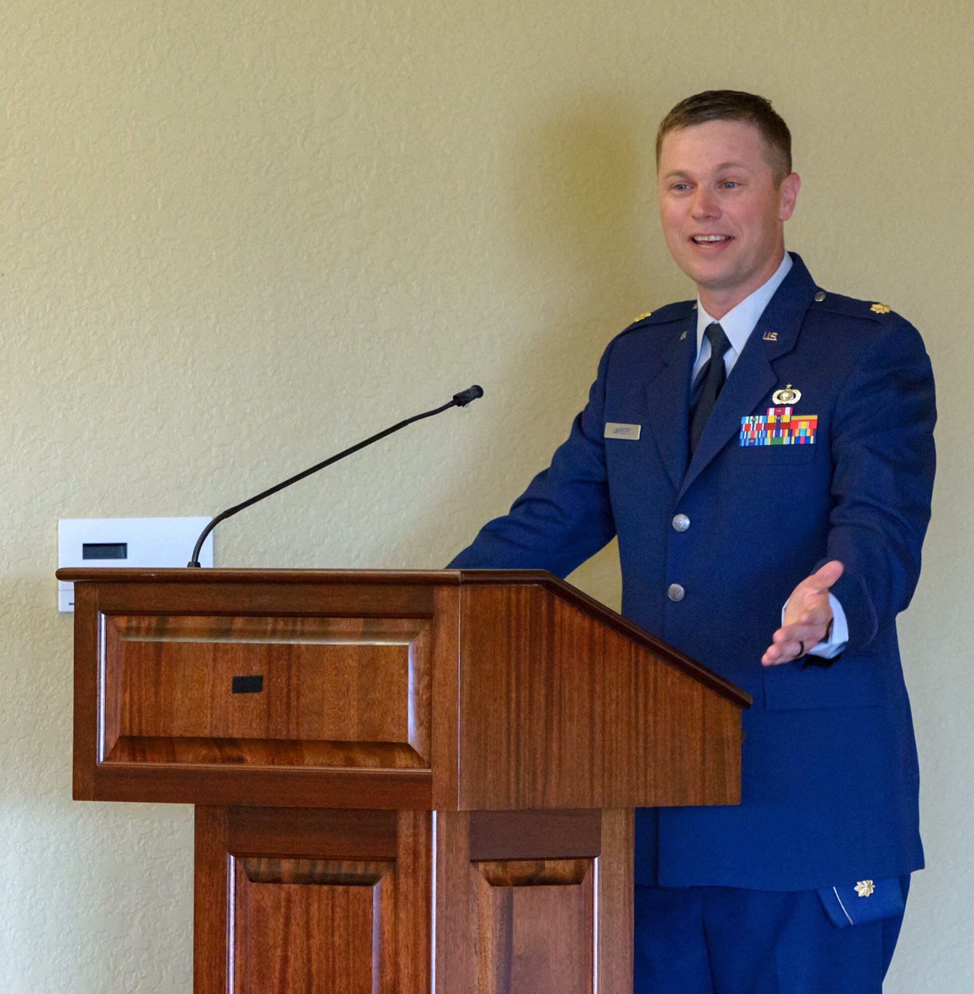 U.S. Air Force Maj. Daniel Lambert, 81st Comptroller Squadron commander, delivers remarks during the 81st CPTS change of command ceremony in the Bay Breeze Event Center at Keesler Air Force Base, Mississippi, June 29, 2018. Lambert assumed command of the 81st CPTS from Maj. Jahayra Lowe, 81st CPTS outgoing commander. (U.S. Air Force photo by Andre’ Askew)