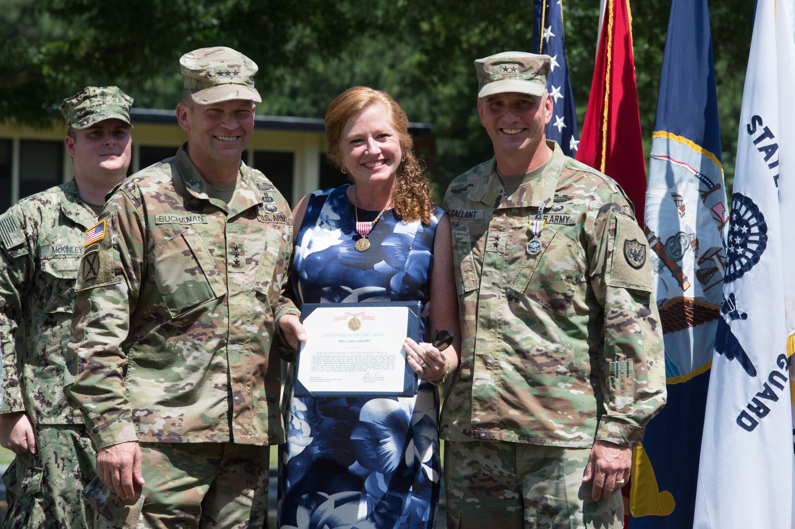 Lt. Gen. Jeffrey Buchanan (left) poses with Maj. Gen. Richard Gallant (right) and his wife, Carol Gallant (center) during a change of command ceremony held at Seay Plaza on Fort Eustis June 29. Gallant was relieved of command of Joint Task Force Civil Support by Maj. Gen. William Hall. (Official DoD photo by Christopher Thompson/released)