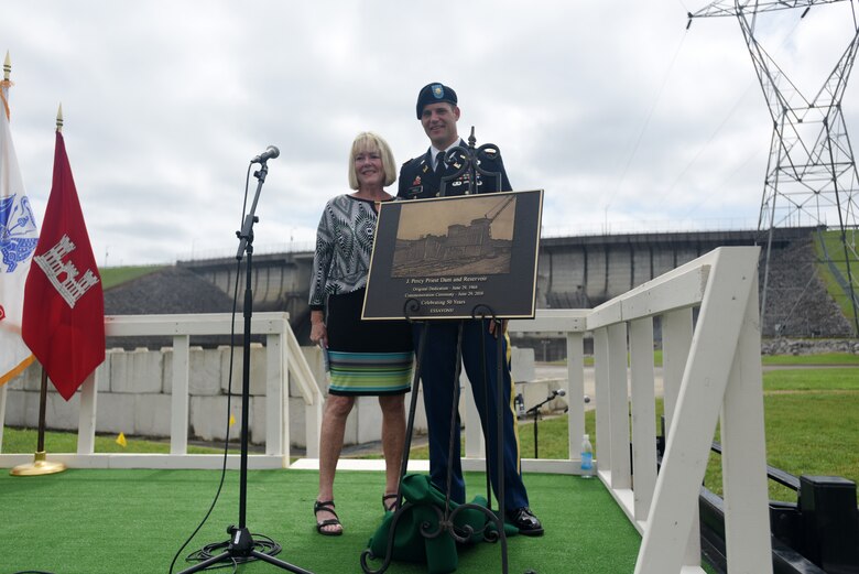 Harriett Priest, daughter of the late Congressman J. Percy Priest, and Maj. Justin Toole, U.S. Army Corps of Engineers Nashville District deputy commander, unveil a commemorative plaque during the 50th Anniversary of J. Percy Priest Dam and Reservoir at the dam in Nashville, Tenn., June 29, 2018. (USACE Photo by Lee Roberts)