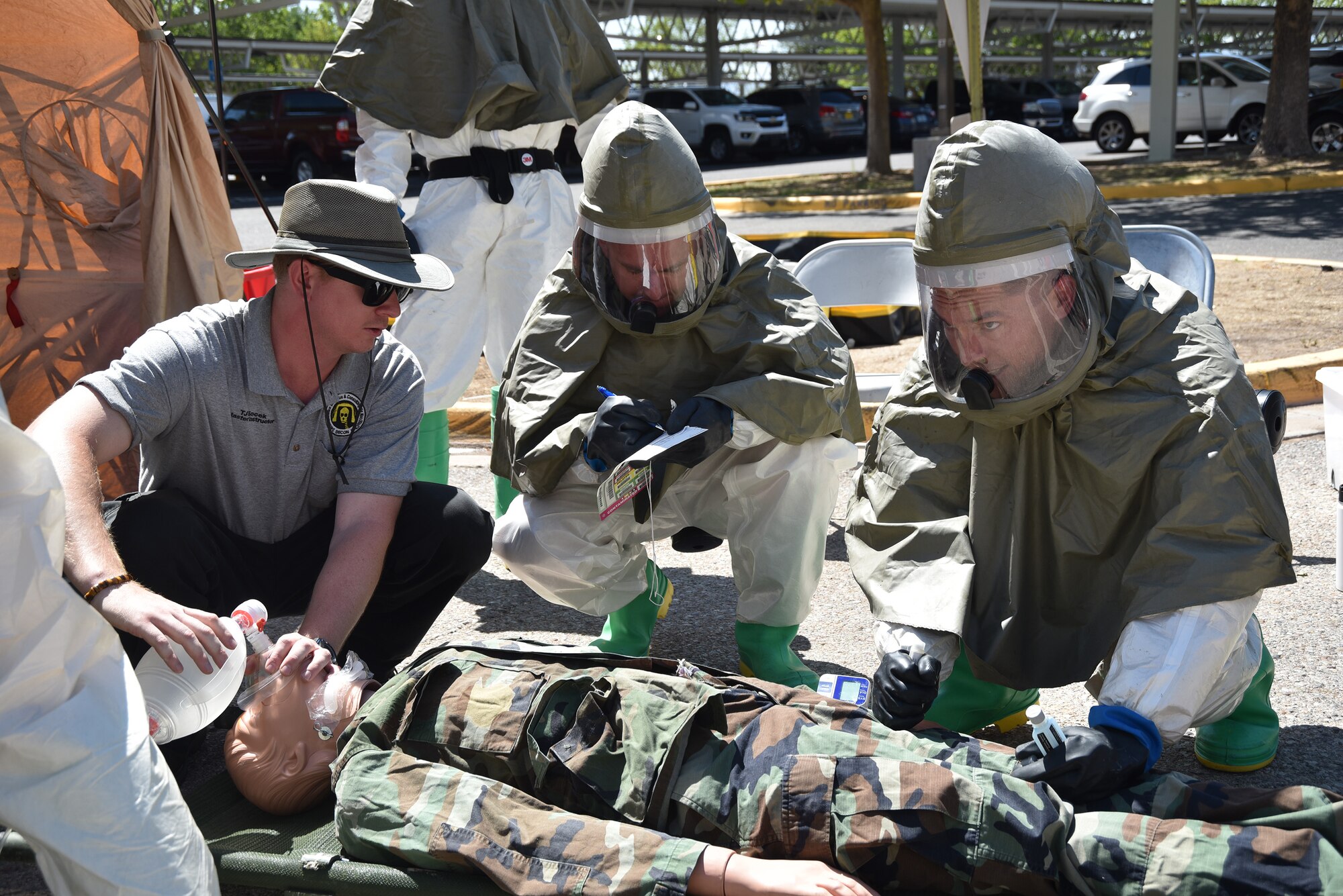 Members of the 377th Medical Group test their triage and decontamination skills during In-Place Patient Decontamination training June 28 at Kirtland AFB’s 377th MDG Main Clinic.