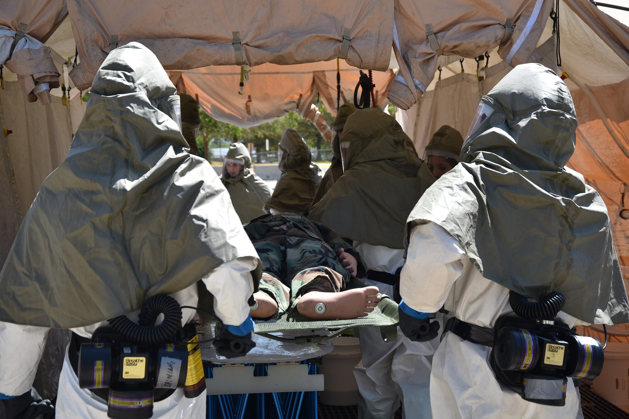 Members of the 377th Medical Group test their triage and decontamination skills during In-Place Patient Decontamination training June 28 at Kirtland AFB’s 377th MDG Main Clinic.
