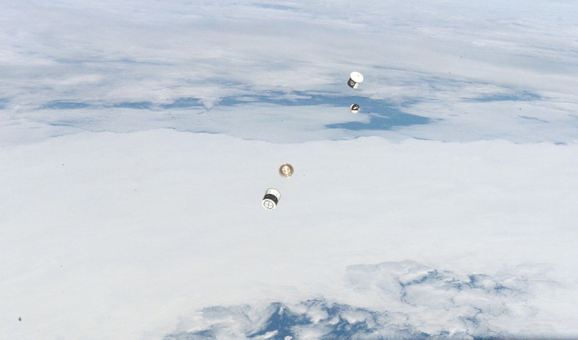 View from aft flight deck window of DOD picosatellite known as Atmospheric Neutral Density Experiment, after release from shuttle payload bay by STS-116 crewmembers, December 2006 (NASA)