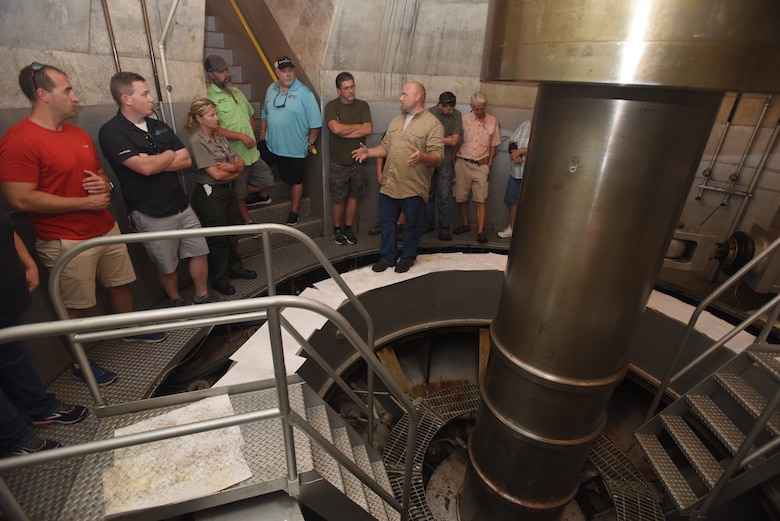 A public tour group gets an up-close view of a generator shaft during a tour of the hydropower plant as part of the 50th Anniversary of J. Percy Priest Dam and Reservoir in Nashville, Tenn., June 29, 2018. (USACE Photo by Lee Roberts)