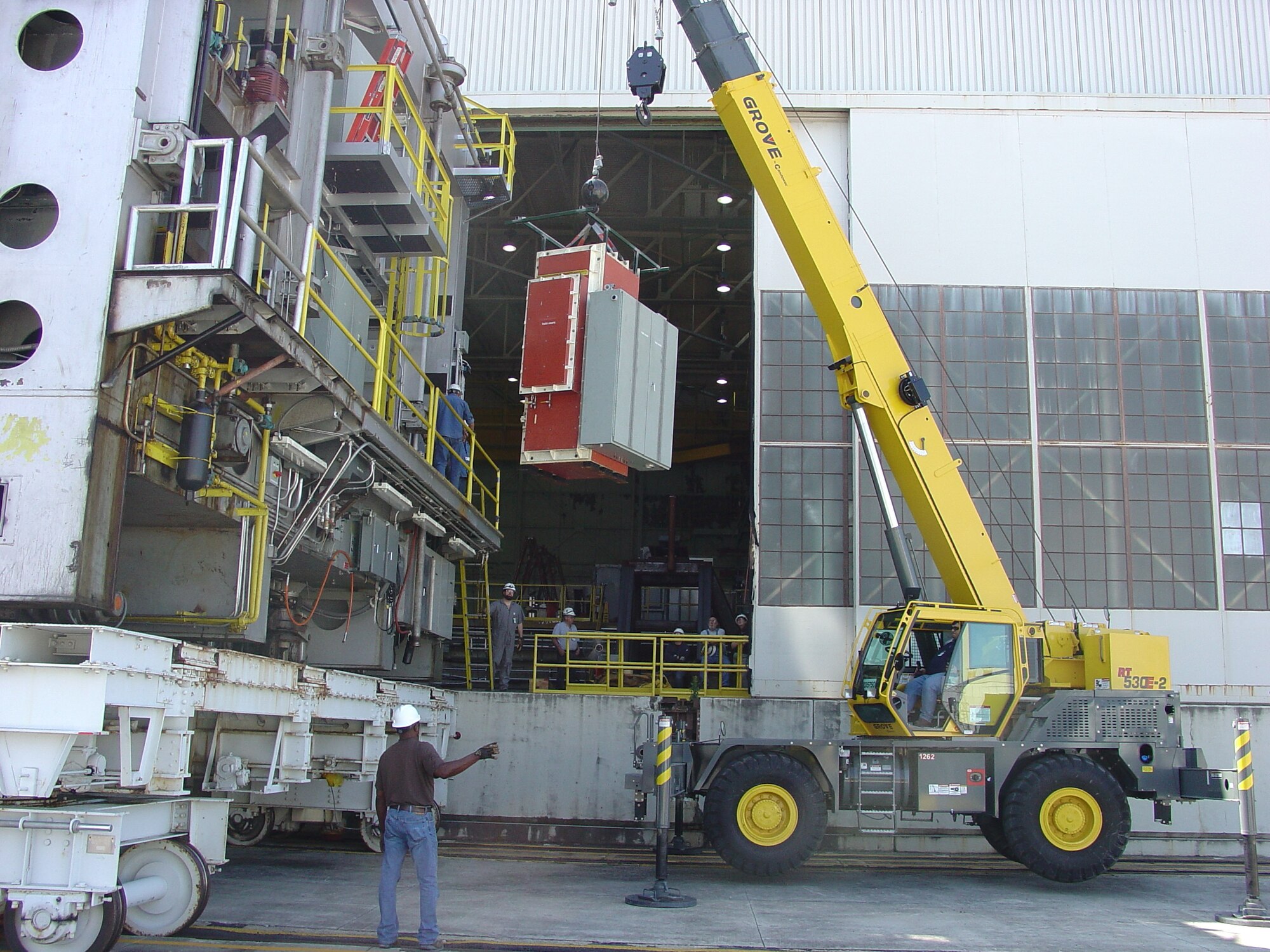 Crews remove an old Data Acquisition and Control enclosure from Cart 2 of Propulsion Wind Tunnel 16T. An effort was launched this fiscal year to bring upgrades to 16T, including the installation of new Data Acquisition and Test Article Control systems and new enclosures for multiple 16T testing carts.  (U.S. Air Force Photo)