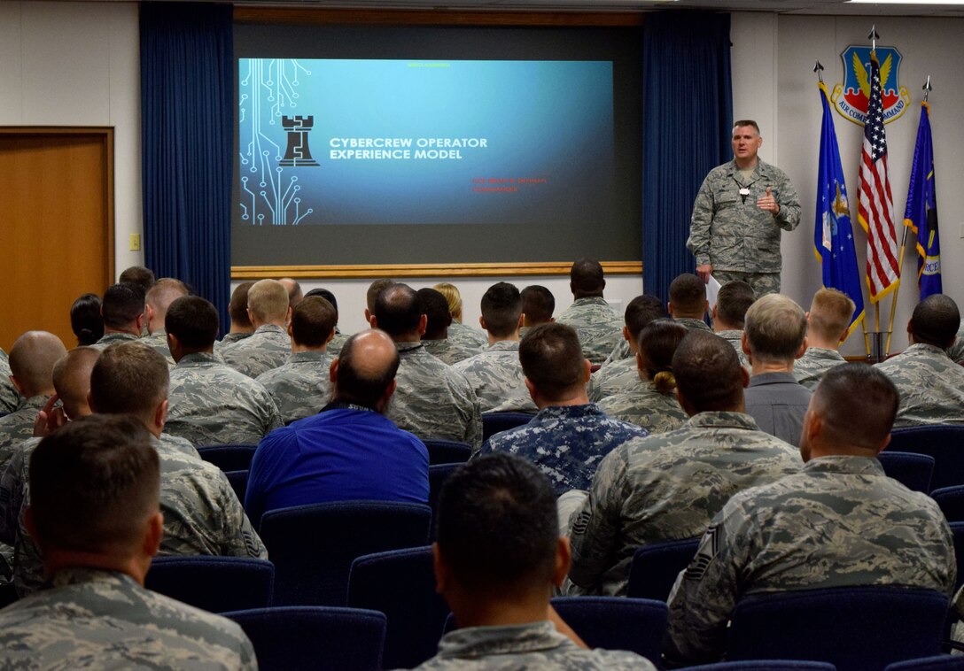 Col. Brian Denman, 567th Cyberspace Operations Group commander, briefs Cyber Protection Team Conference 18-1 attendees at Joint Base San Antonio-Lackland, Texas, June 26, 2018. The three day, 567th COG-hosted conference gathered Total Force and joint cyber professionals to share best practices to improve operational CPT effectiveness. U.S. Cyber Command CPTs defend national and DOD networks and systems against threats, as part of the combatant command’s Cyber Mission Force.
