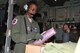 Tech. Sgt. Karen Moore, 53rd Weather Reconnaissance Squadron loadmaster, prepares dropsondes during flight before entering Hurricane Irma just before it makes landfall Sept. 10, 2017. (U.S. Air Force photo by Master Sgt. Jessica Kendziorek)