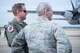 Lt. Col. Sean Cross, 53rd Weather Reconnaissance Squadron pilot, speaks to Maj. Gen. Robert LaBrutta, 2nd Air Force commander, during a 403rd Wing immersion tour Feb. 3 at Keesler Air Force Base, Mississippi. (U.S. Air Force photo/Staff Sgt. Heather Heiney)