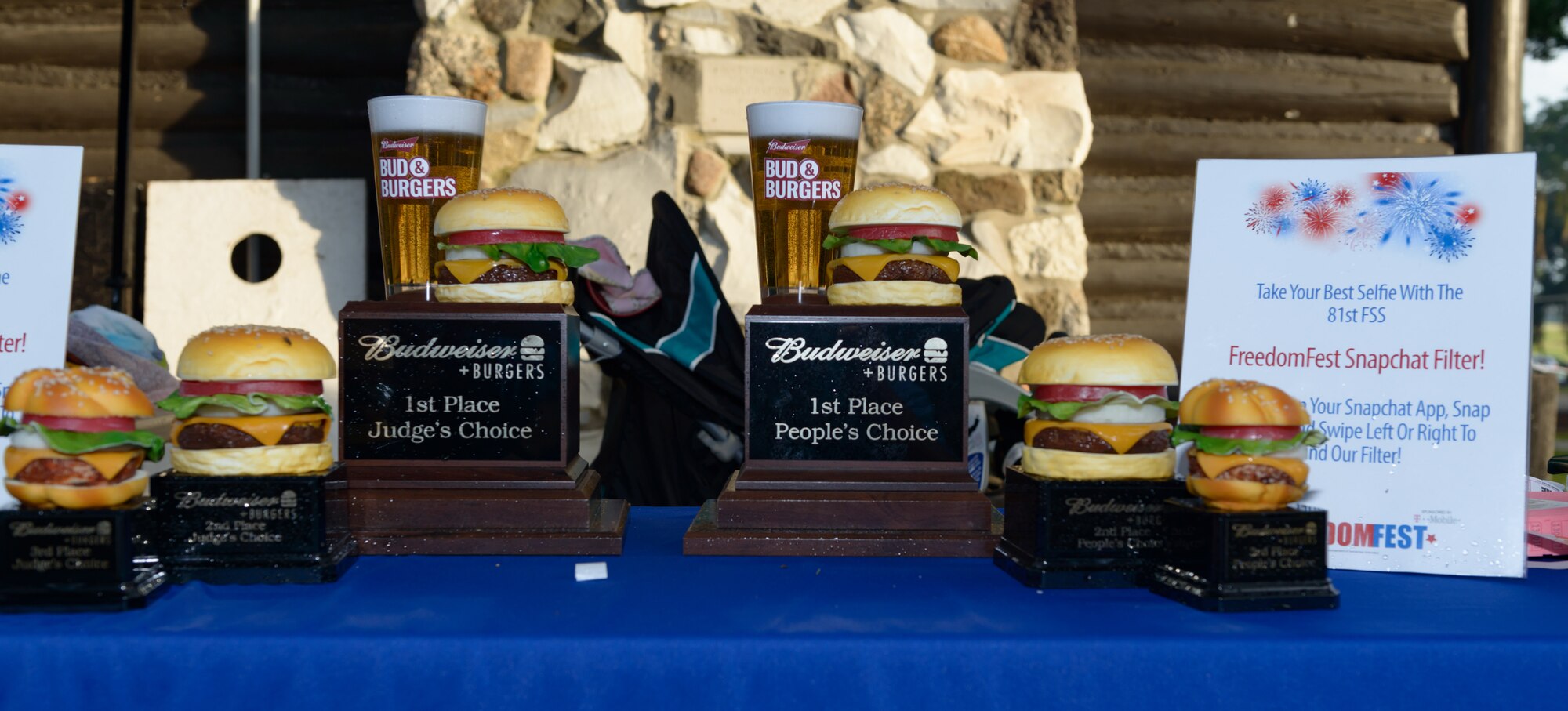 Trophies for the Buds and Beer competition are displayed during Freedom Fest at Marina Park on Keesler Air Force Base, Mississippi, June 30, 2018. The event included carnival rides, a burger cook-off, hot wings and watermelon eating competitions and a fireworks display. (U.S. Air Force photo by Andre’ Askew)