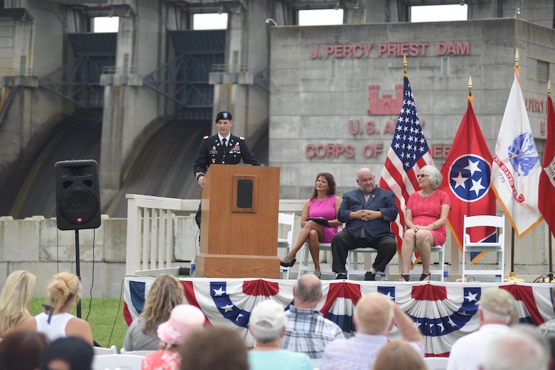Maj. Justin Toole, U.S. Army Corps of Engineers Nashville District deputy commander, talks about project benefits during the 50th Anniversary of J. Percy Priest Dam and Reservoir at the dam in Nashville, Tenn., June 29, 2018.  The major said President Lyndon B. Johnson’s vision of reducing flooding, providing water, creating hydropower, and recreation has come to fruition over the past 50 years. (USACE Photo by Lee Roberts)