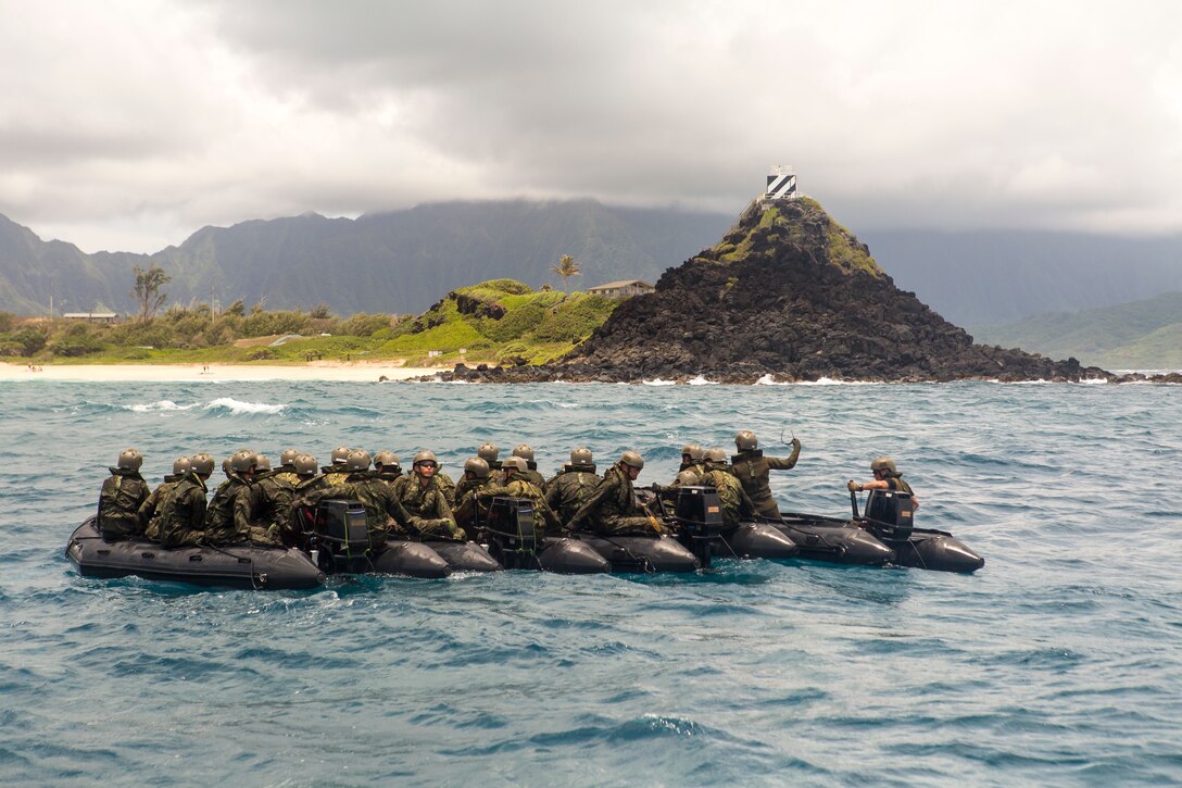 Japanese soldiers with the Japan Self-Defense Forces form together during a beach insertion rehearsal at Pyramid Rock as part of Rim of the Pacific (RIMPAC) exercise on Marine Corps Base Hawaii July 1, 2018. Twenty-five nations, 46 ships, five submarines, about 200 aircraft and 25,000 personnel are participating in RIMPAC from June 27 to Aug. 2 in and around the Hawaiian Islands and Southern California.