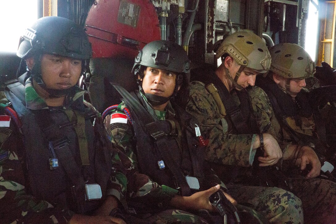U.S. Marines and Malaysian soldiers board a CH-53E Super Stallion helicopter prior to conducting helo-cast training during Rim of the Pacific (RIMPAC) exercise at Marine Corps Base Hawaii June 30, 2018. The helo-cast training is meant to prepare the service members for an amphibious insertion during RIMPAC. RIMPAC provides high-value training for task-organized, highly-capable Marine Air-Ground Task Force and enhances the critical crisis response capability of U.S. Marines in the Pacific. Twenty-five nations, 46 ships, five submarines, about 200 aircraft and 25,000 personnel are participating in RIMPAC from June 27 to Aug. 2 in and around the Hawaiian Islands and Southern California.
