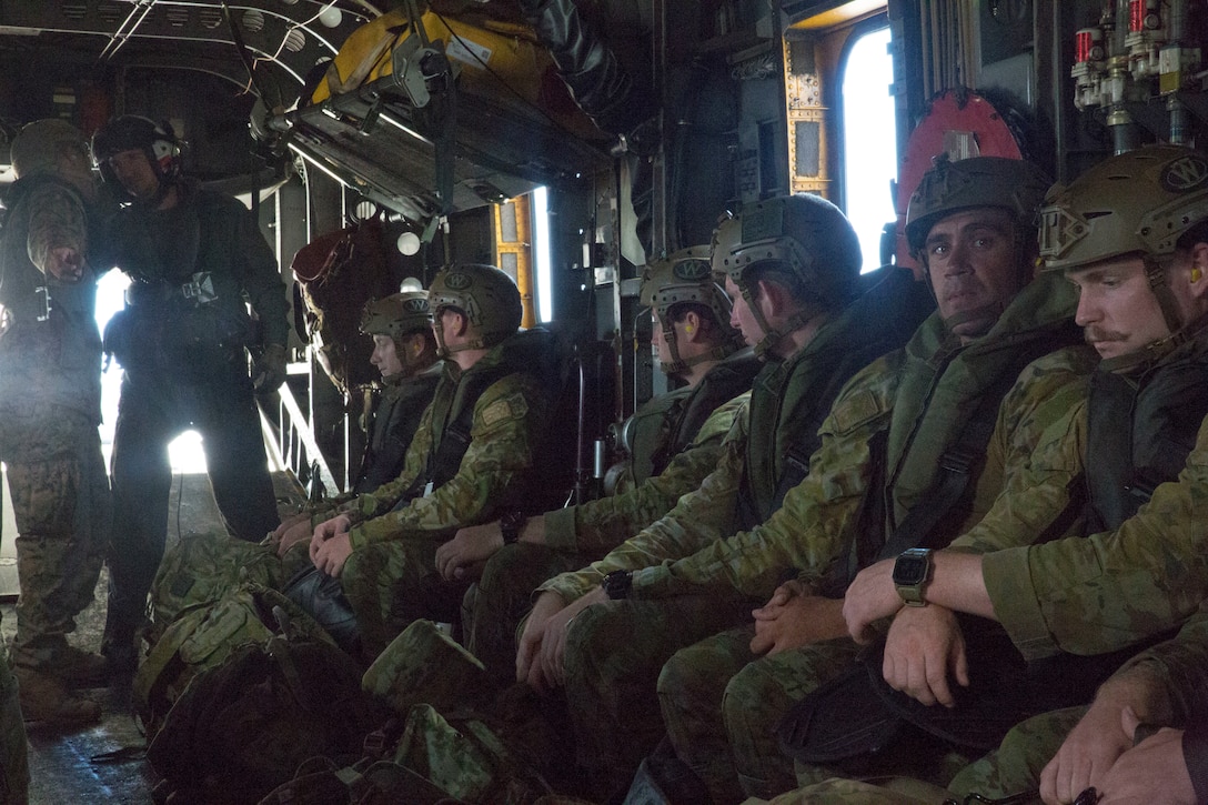 Australian soldiers board a CH-53 E Super Stallion helicopter prior to helo-cast training during Rim of the Pacific (RIMPAC) exercise at Marine Corps Base Hawaii June 30, 2018. The helo-cast training is meant to prepare the service members for an amphibious insertion during RIMPAC. RIMPAC provides high-value training for task-organized, highly-capable Marine Air-Ground Task Force and enhances the critical crisis response capability of U.S. Marines in the Pacific. Twenty-five nations, 46 ships, five submarines, about 200 aircraft and 25,000 personnel are participating in RIMPAC from June 27 to Aug. 2 in and around the Hawaiian Islands and Southern California.