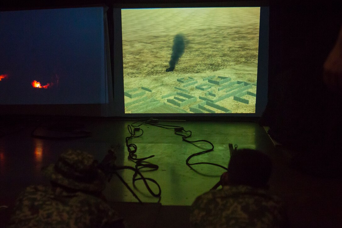 Indonesian Marines fire stimulated M240B machine guns in an indoor simulated marksmanship trainer during Rim of the Pacific (RIMPAC) exercise on Marine Corps Base Hawaii June 30, 2018. RIMPAC provides high-value training for task-organized, highly-capable Marine Air-Ground Task Force and enhances the critical crisis response capability of U.S. Marines in the Pacific. Twenty-five nations, 46 ships, five submarines, about 200 aircraft and 25,000 personnel are participating in RIMPAC from June 27 to Aug. 2 in and around the Hawaiian Islands and Southern California.