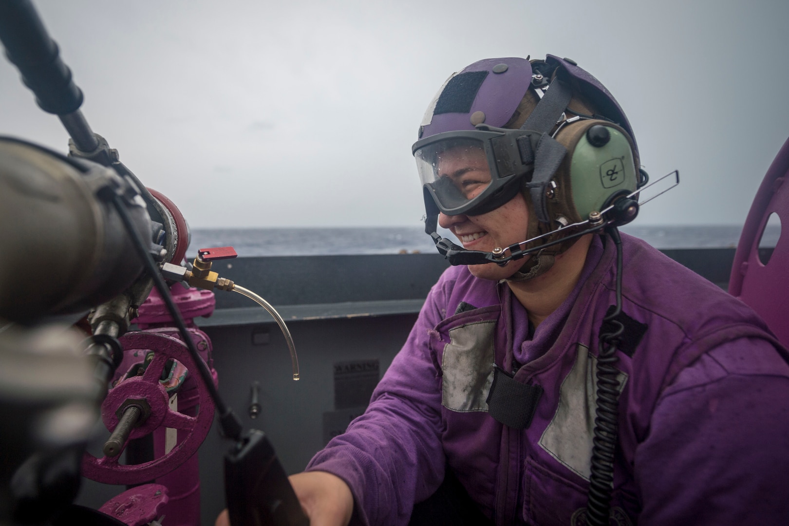 Gas Turbine System Technician (Mechanical) 3rd Class Mackenzie Mattox, from Middletown, Ohio, prepares to inspect JP-5 fuel on the flight deck of the Ticonderoga-class guided-missile cruiser USS Chancellorsville (CG 62). Chancellorsville is forward-deployed to the U.S. 7th Fleet area of operations in support of security and stability in the Indo-Pacific region.