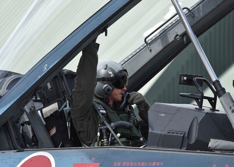 U.S. Air Force Col. R. Scott Jobe, the 35th Fighter Wing commander, sits in a Mitsubishi F-2 cockpit before a familiarization flight at Misawa Air Base, Japan, June 22, 2018. This flight allowed Jobe, an F-16 Fighting Falcon pilot, the opportunity to experience the aircraft's capabilities, allowing him to better understand how Japan Air Self-Defense Force and the USAF compliment each other in the mutual defense of Japan. (U.S. Air Force photo by Airman 1st Class Collette Brooks)